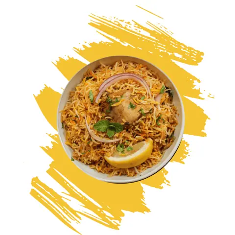 Bowl of chicken biryani garnished with lemon and onion slices