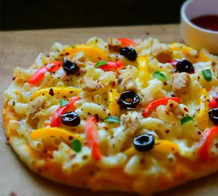 Vegetable pizza topped with olives, bell peppers, and cheese