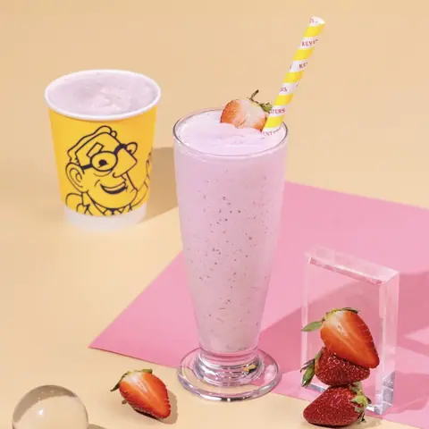 Strawberry milkshake with fresh strawberries and Keventers branded cup