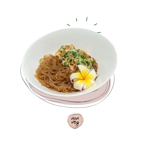 Korean dish with noodles and garnished egg in white bowl